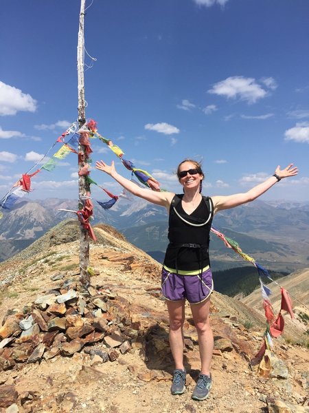 Julie on the summit of Mt. Emmons.