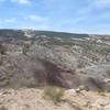 Looking across Little Park Road at The Ribbon and the Colorado National Monument's monocline.