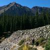 Cross through a patch of scree on the way to the lake