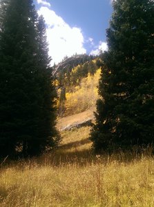 Approaching some cliffs that line the later part of the valley