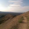 Descent down the Yucaipa Regional Park Trail.  The trail is a steeper grade than the road and it is singletrack.