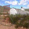 A water tank, owned by Bowen Ranch, hidden among the eastern foothills. Cattle wander pretty far into the mountains on some of the area trails.