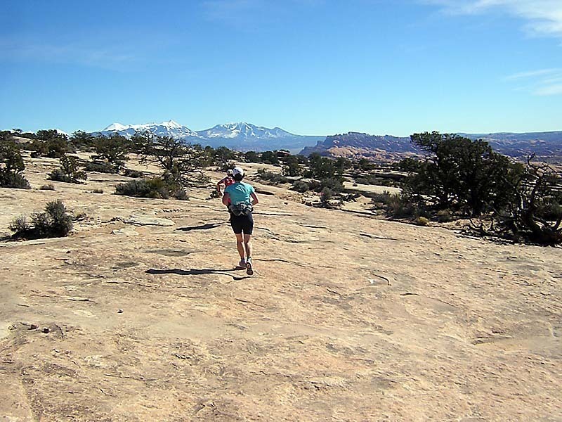 Running along the slick rock.