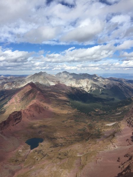 Capitol peak and Snowmass village from the summit.