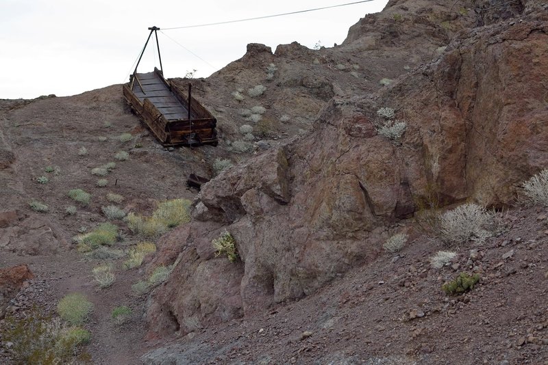 Old mining equipment overhangs the Liberty Bell Arch Trail.