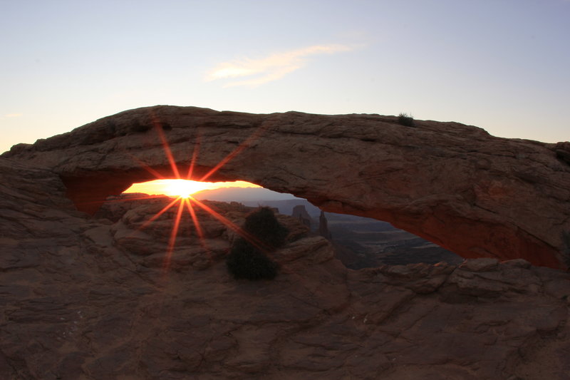 Sun shining inside the arch.