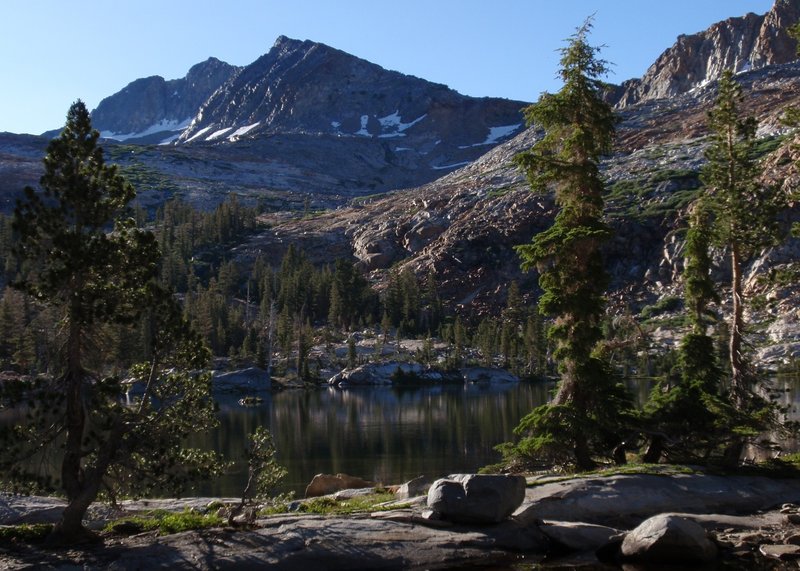 Lower Ottoway Lake peeks out from the Red Peak Pass trail.