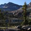 Lower Ottoway Lake peeks out from the Red Peak Pass trail.