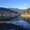 Sullivan Lake reflecting the surrounding mountains.