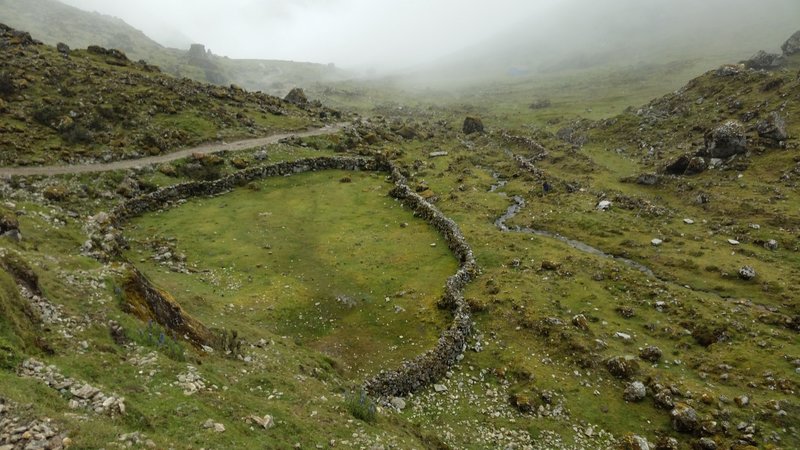 Homesteading, Andes style.  Our understanding is that locals can develop a section of land and if they live on it for a period of time each year, they can get the rights to the land.  In this picture, this development appears to be a horse corral.