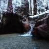 Small warm waterfall from upper pool.