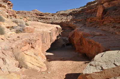 This is the entrance after walking .5mi from trailhead.  Go left or right to avoid scrambling over the boulder in the center. Both ways will lead you back down after you clear the blockage.