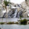 Waterfalls alongside the lake.