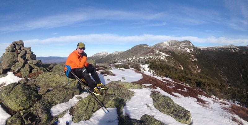 Taking a break on the Presidential Traverse, facing Mt. Washington. The famous Tuckerman's Ravine is down to the right.