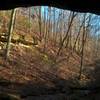 A view from inside the cave on the WCCC Short Loop, looking out over the creek-bed and valley.