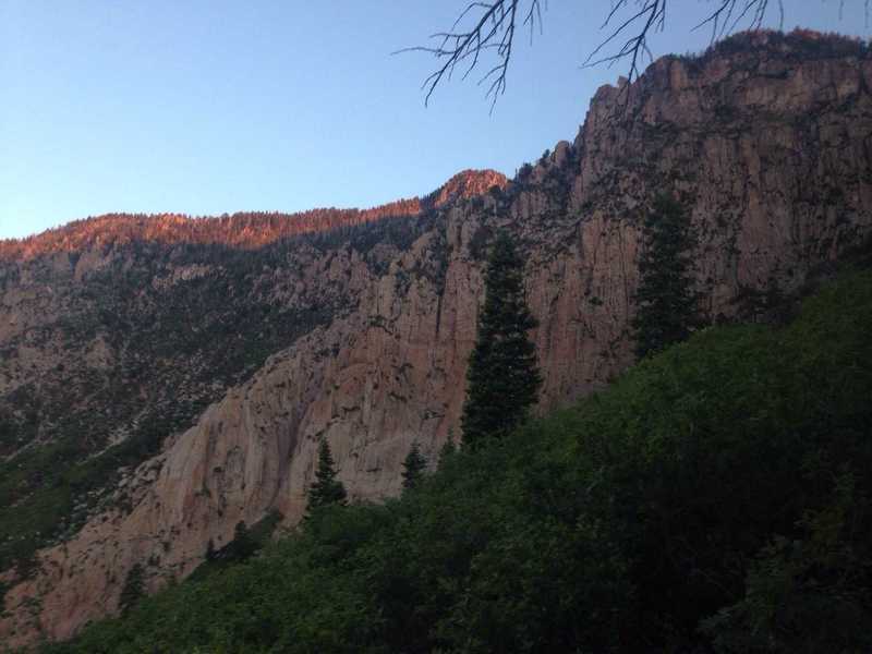 A view of the sun rising up over the Pine Valley Mountains as well as some of the amazing granite cliffs in the area.