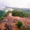 The mist rolls in above the Na Pali Coast, Kaua'i, Hawai'i.