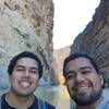 Standing on a rock in the middle of the Rio grande river, in Santa Elena Canyon trail at Big bend national park.