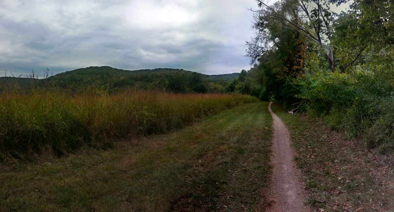 Heading south, approaching the uphill. Prairie to the left.