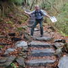 Heading up the flight of stairs.