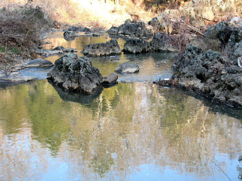 Reflection on rocks in creek at Johnston Mill.