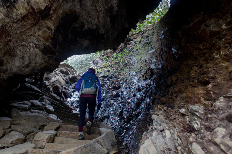 Walking through Arch Rock.