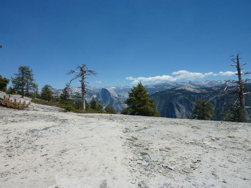 Rocky top of El Cap - View of Half Dome.