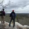 A couple hikers pausing to take in the view along the Pine Mountain Trail.