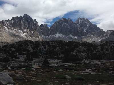 A view of (from left to right) Mount Winchell, Thunderbolt Peak and the North Palisade from Dusy Basin, dusted by a small July snowstorm