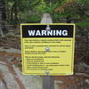 Warnings before the steep ascent of the Beehive Trail. Not recommended for children or people with fear of heights, and dogs are prohibited.
