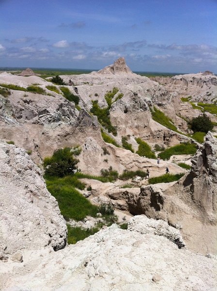 Looking back toward the Notch Trail trailhead. In the center of the photo you can see the incredible log ladder climbing up the side of the canyon. Badlands National Park, SD.