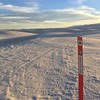 Orange markers show the route of the Alkali Flat Trail.