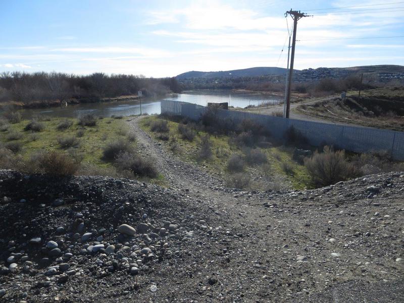 After crossing the railroad tracks drop off the paved trail and follow this path into Chamna Natural Preserve.