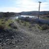 After crossing the railroad tracks drop off the paved trail and follow this path into Chamna Natural Preserve.