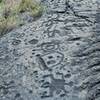 More petroglyphs etched into the lava.