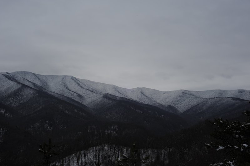 Snow capped mountains as the day wanes. View from Bote Mountain Trail.