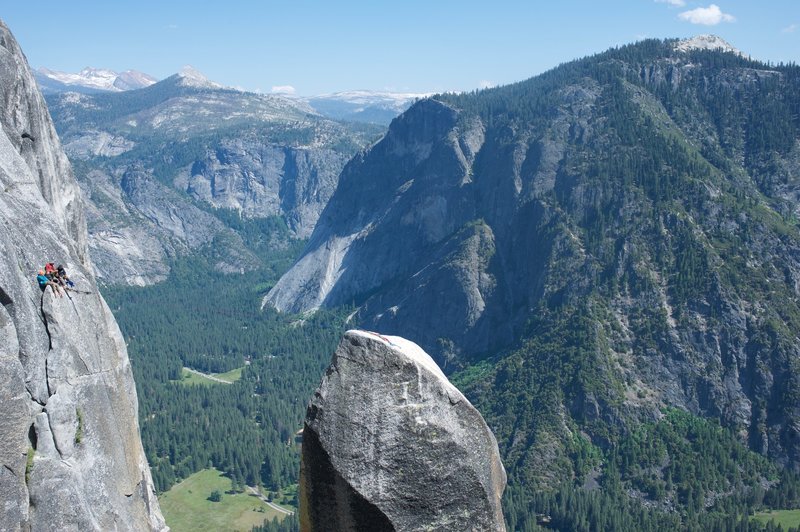 Slack lining at the Lost Arrow. The views are outstanding, and I bet it is an adrenaline rush.