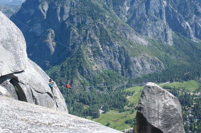 Watching slack liners high above Yosemite Valley at the Lost Arrow.