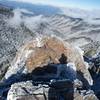 Charlie's Bunion looking out across the snow covered valley.