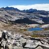 View east from Isberg Pass of the Ritter Range and the Minarets peaking up over the ridge.