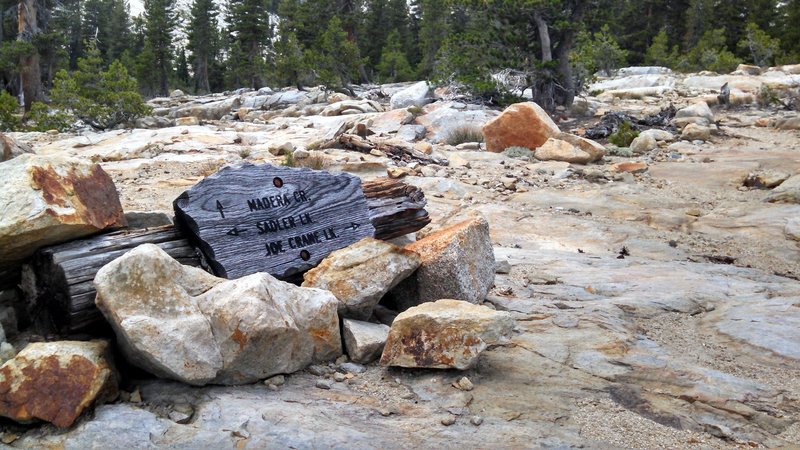 This trail junction is extremely easy to miss on your way up to Joe Crane Lake from the Isberg Trail. Take your time in the rocky section of trail and look for this sign and a trail heading uphill to the lake.