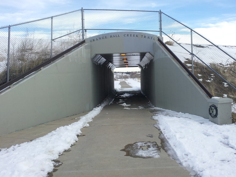 Trail goes under the railroad tracks. Yes, here it is back to being called "Grange Hall Creek Trail."