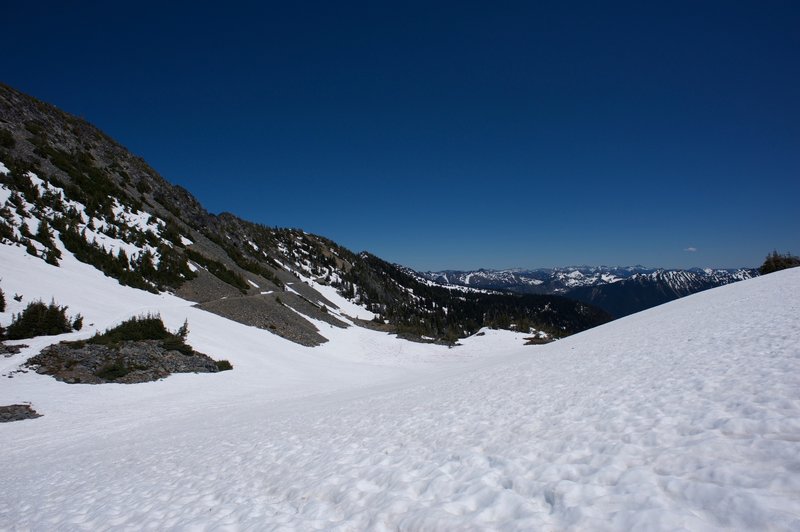 The trail follows the ridge back to Sunrise.