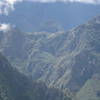 One of the reasons people take the Salkantay route to Machu Picchu is that you get a unique view of the ruins that few people see. Here, in the upper middle section of the photo, is our first view of Machu Picchu. You can see the terracing on the downslope.