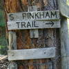 Sign at the end of Asotin Creek Trail and the bottom end of North Pinkham Trail.