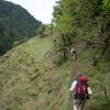 Steep, narrow trail along the hillside.