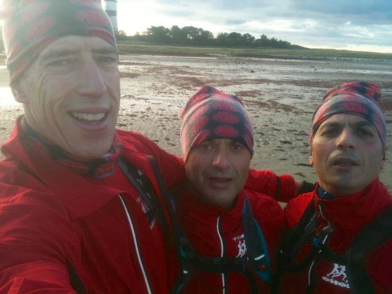 At the finish line with the lighthouse behind us!