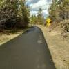 Approaching one of two marked road crossings on this section of the Fish Lake Trail.