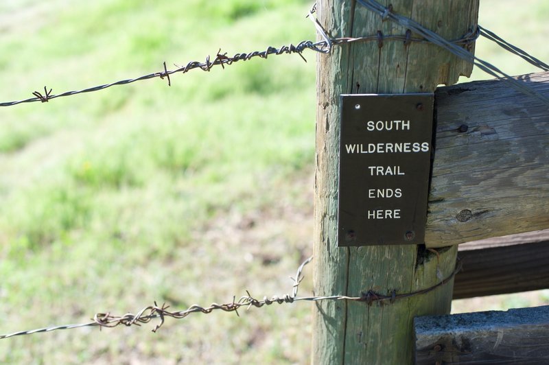 2.3 miles from the beginning of the trail, you reach the park boundary.