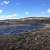 Crab Creek, with some basalt formations far in the distance.